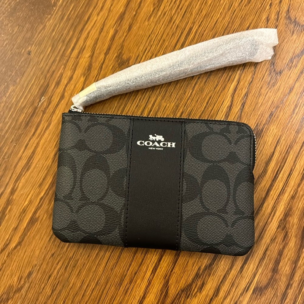 Black Coach logo wristlet